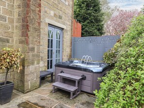 Hot tub on the patio outside the kitchen