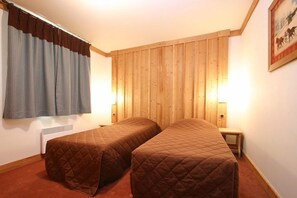 Relax on the comfy bed after a day outside.