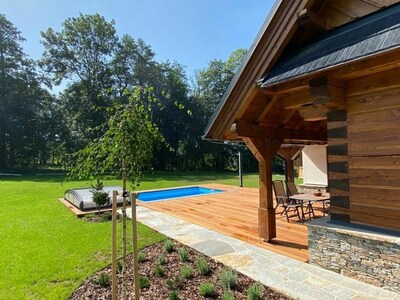 Sky, Plant, Building, Shade, Tree, Swimming Pool, Outdoor Furniture, Wood, Cottage, House