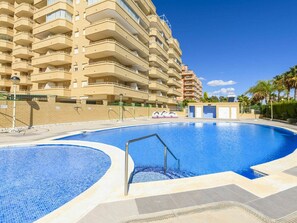 Water, Sky, Building, Property, Swimming Pool, Blue, Azure, Window, Outdoor Furniture, Tree