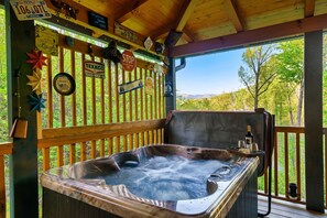 Soak in the hot tub and enjoy the mountain views.