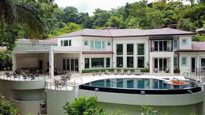 Casa Magnifica, has a large infinity pool jacuzzi  and rainforest drop that amaze you.