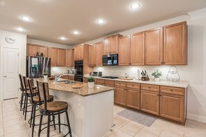Kitchen stocked with everything you need to cook your own gourmet meals.