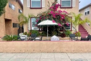 BBQ on the patio , or relax while reading , quiet residential area. Easy street parking . 