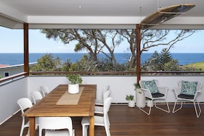 Outdoor dining & BBQ with tree lined ocean views… perfect