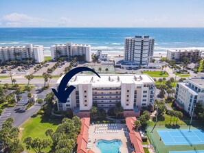Aerial view of Building #20.  This fantastic condo is located right next to the pool and amenities and within walking distance to the beach!