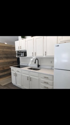 kitchen - with coffee maker and essentials 