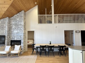 Dining Area + entryways to bedrooms
Loft space above
