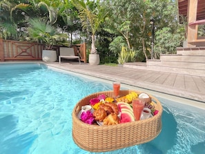 Floating tray available for the swimming pool (contents not included).