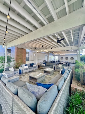 Back patio of the main house! Dining for 32 & Tons of lounge furniture.