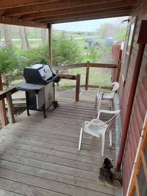 Covered front porch, entrance is adjacent to kitchen and utility room