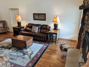 As you open the front door, you will be amazed at hardwood floors and area rug.