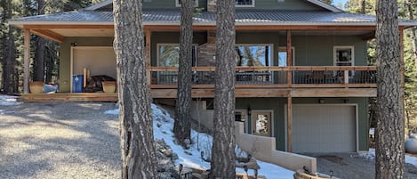 Woodlands Chalet upper door main entrance, lower entrance, long  driveways.