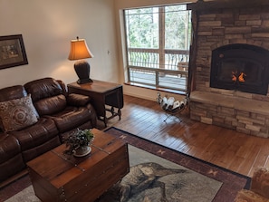 Living room windows facing Sierra Blanca Mountain.