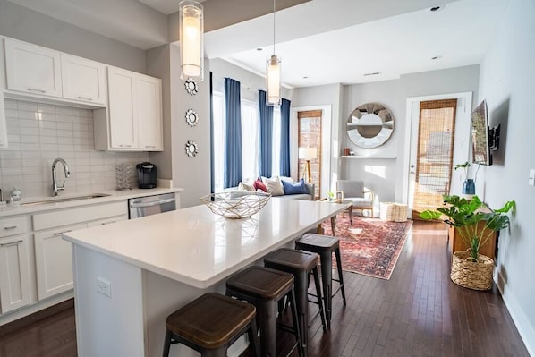 Our second floor features an open concept kitchen and living area