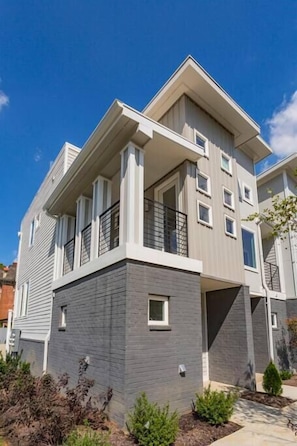 Welcome to your Nashville home away from home! Our condo features two balconies, three levels, and a single car garage