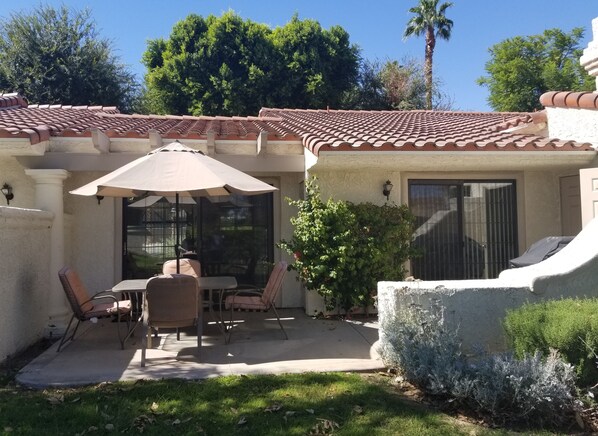 Cozy, semi-private, poolside. Cushions have been replaced, see photo following