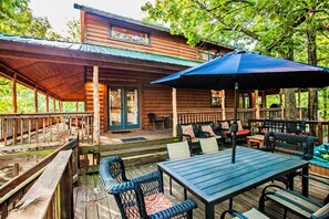 Outdoor Deck Area with Table, Chairs, and Hot Tub