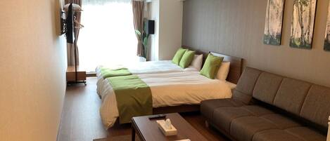 Double bed, single bed, single sofa bed room