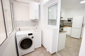 A washing machine and a brand new hot water heater
