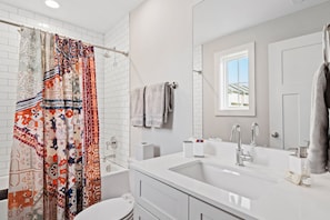 Bathroom located next to the first bedroom.