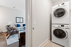 There are a washer and dryer in the unit - detergent provided.