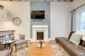 Cozy living room area, perfect for relaxing and watching a movie in between exploration.
