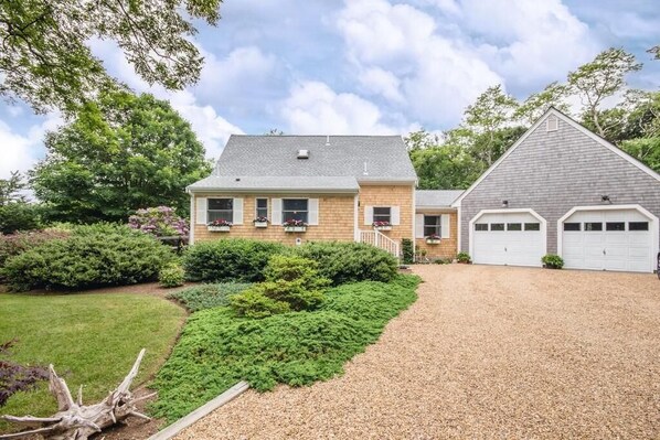 Front of house- at the end of a long, wooded, private driveway