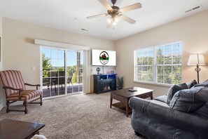 Living Area with Sleeper Sofa, Cable TV, Seasonal Fireplace, Balcony Access