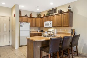 Full Kitchen with Extra Bar Seating