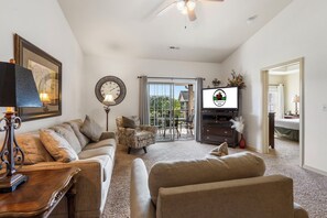 Living Area with Cable TV, Sleeper Sofa, New Furniture, Balcony Access