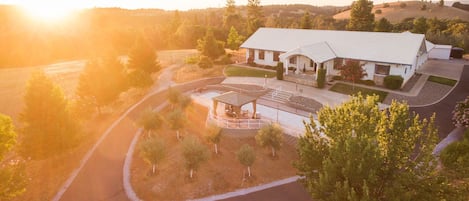 Beautiful Sunsets! Wrap around driveway near our bocce ball court & olive trees