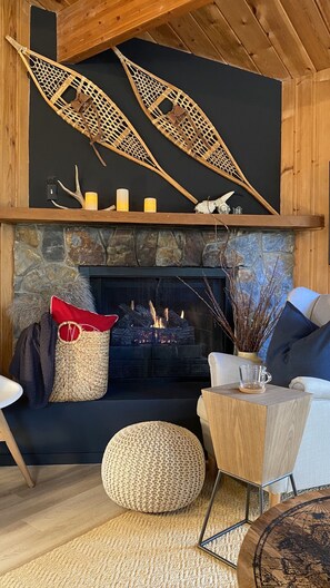 Cozy gas fireplace in upstairs living area