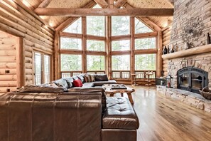 This incredible spot has tons of space for your family and friends to gather around by the fire and make memories.  