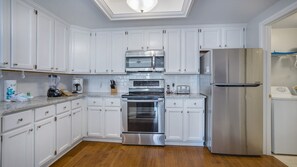Fully equipped kitchen with stainless steel appliances