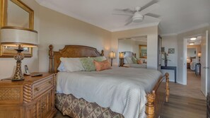 Primary bedroom featuring a king-size bed
