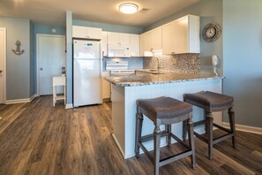 Cozy kitchen with bar top for additional seating