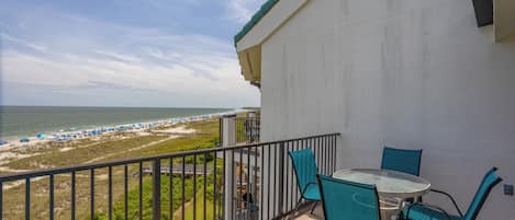 Top floor unit with private balcony and panoramic ocean views