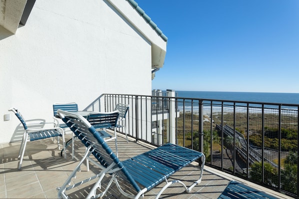 Top floor unit with private balcony and ocean views