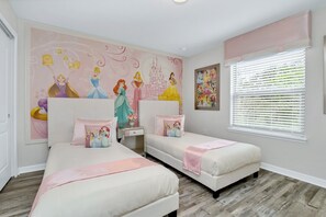 Adorable Princess themed twin bedroom with flat screen TV