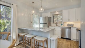 Fully updated kitchen with bar seating