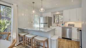Fully updated kitchen with bar seating