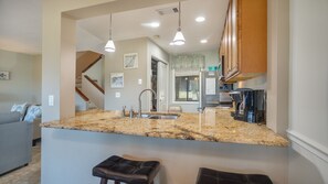 Spacious kitchen bar top for additional seating