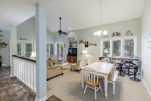 Open-concept dining area with coastal charm