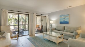 Spacious living area with direct access to screened porch