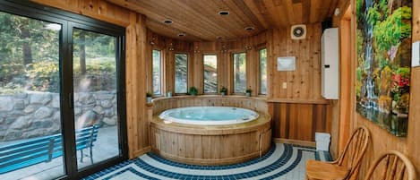 Escape to luxury on the lower level with our six-seater jet hot tub! Dive into a world of relaxation where you can soak away your worries without ever leaving the comfort of your hideaway.  Follow our Instagram for more hidden treasures: @hiddenhideouts