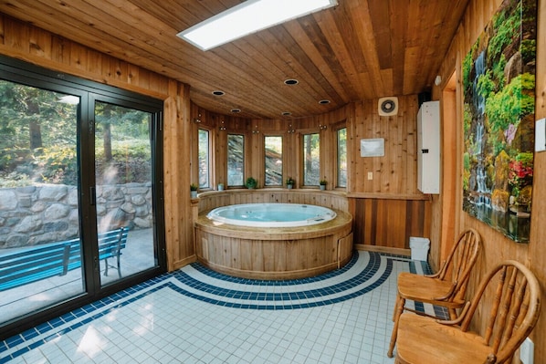 Escape to luxury on the lower level with our six-seater jet hot tub! Dive into a world of relaxation where you can soak away your worries without ever leaving the comfort of your hideaway.  Follow our Instagram for more hidden treasures: @hiddenhideouts