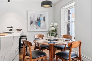 Sit at the breakfast bar, or enjoy a family-style meal at the dining table. 