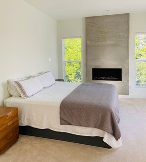 Master bedroom has soundproof walls, a memory foam king mattress, and fireplace 