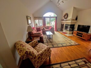 Living Room with Wood Burning Fireplace for your enjoyment.